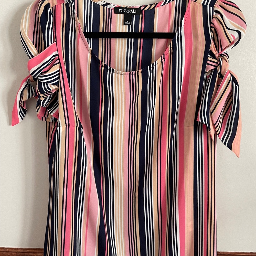 Woman’s striped blouse size M